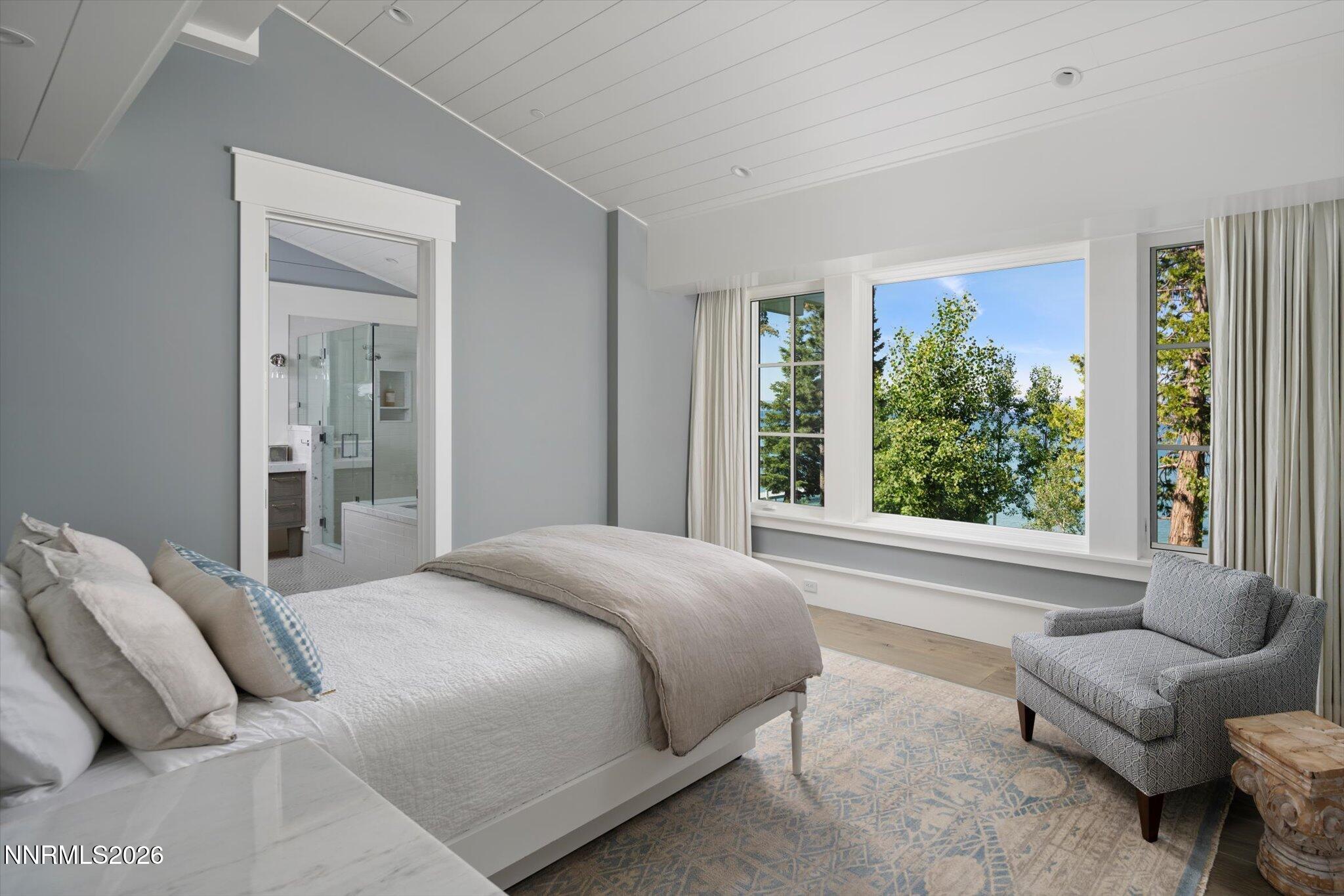 226 4 Ring Road Tahoma, CA 96142 - Photo 28 of 41 a bedroom with furniture and a large window