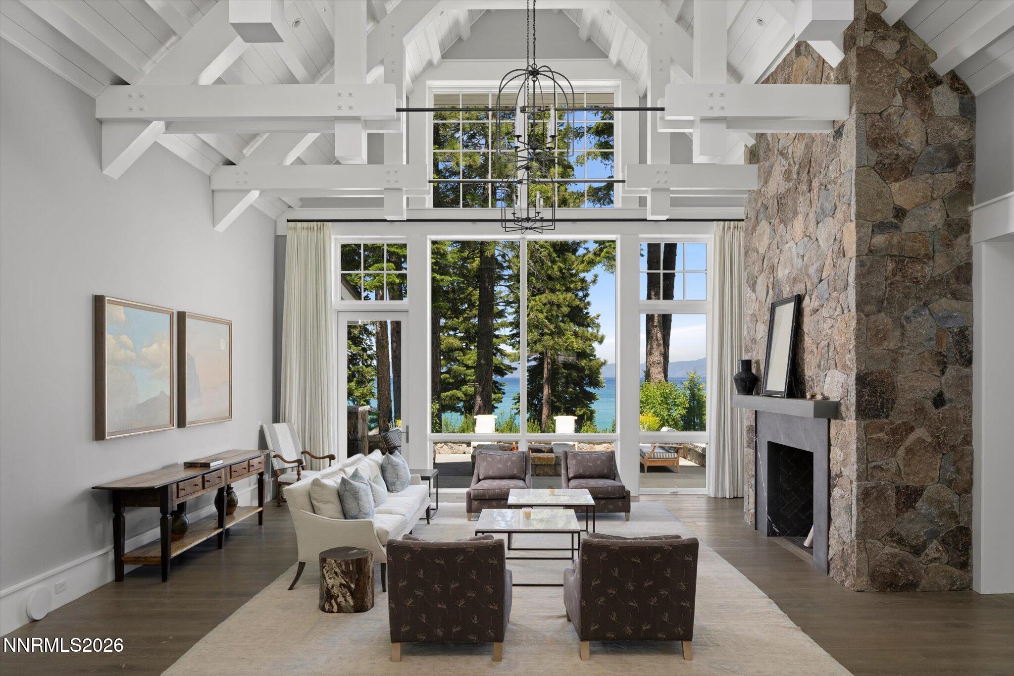 226 4 Ring Road Tahoma, CA 96142 - Photo 9 of 41 a living room with fireplace furniture and a large window