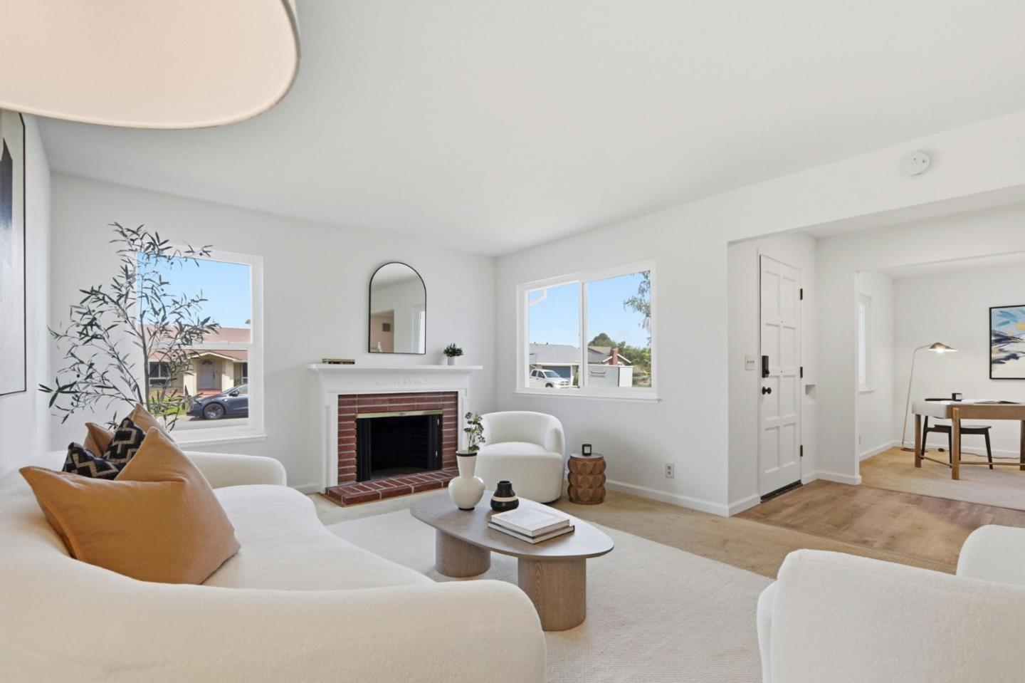 546 Woodstock Way Santa Clara, CA 95054 - Photo 1 of 24 a living room with furniture and a fireplace