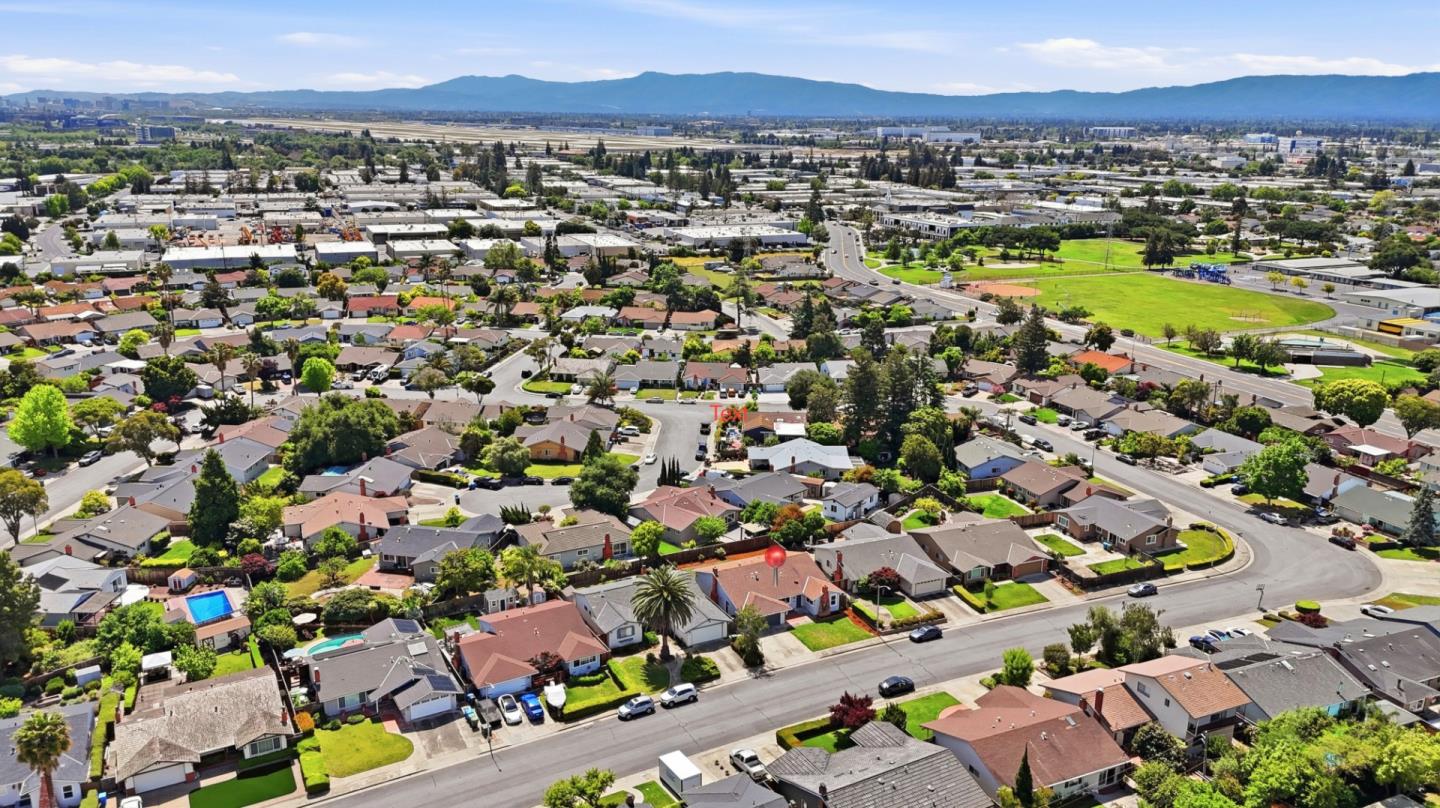 546 Woodstock Way Santa Clara, CA 95054 - Photo 22 of 24 an aerial view of residential houses with outdoor space and swimming pool
