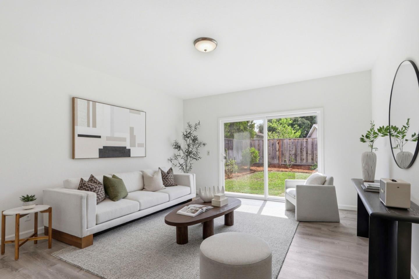 546 Woodstock Way Santa Clara, CA 95054 - Photo 10 of 24 a living room with furniture and a window