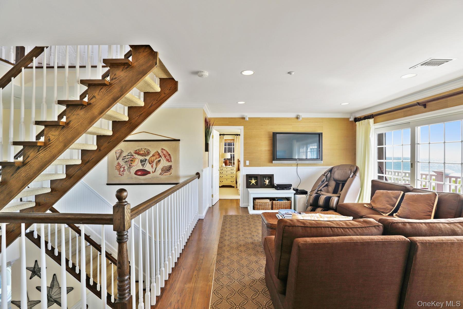 949 B Dune Road West Hampton Dunes, NY 11978 - Photo 7 of 19 Living room featuring ornamental molding and wood-type flooring