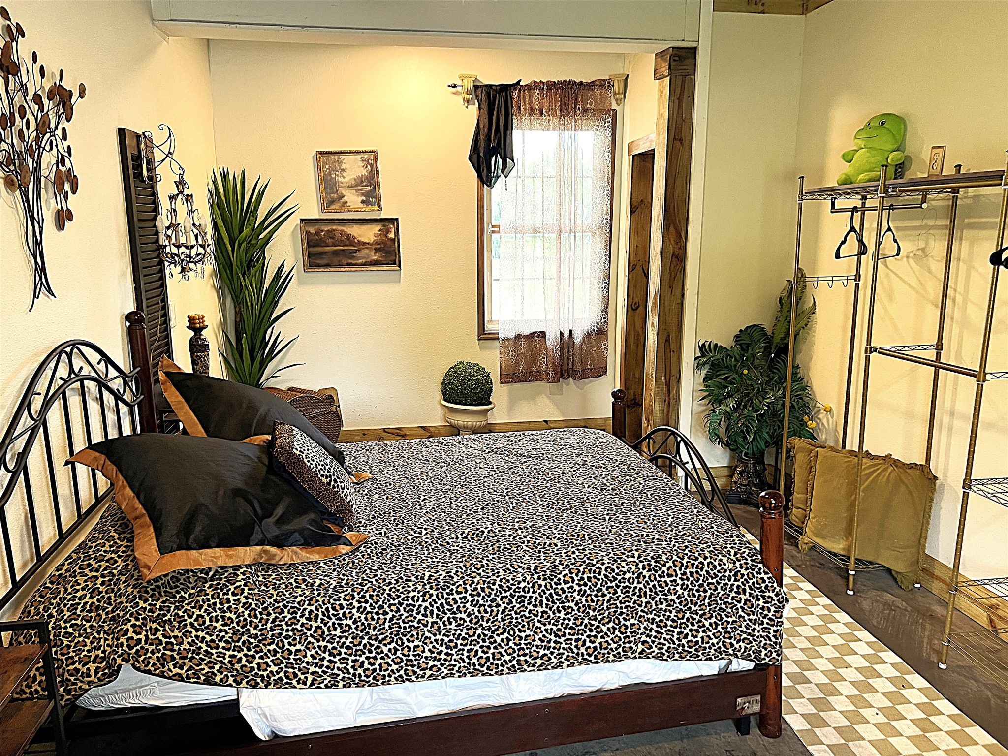 2503 River Crest, Unit 1 Houston, TX 77338 - Photo 13 of 28 a bedroom with a bed and wooden floor