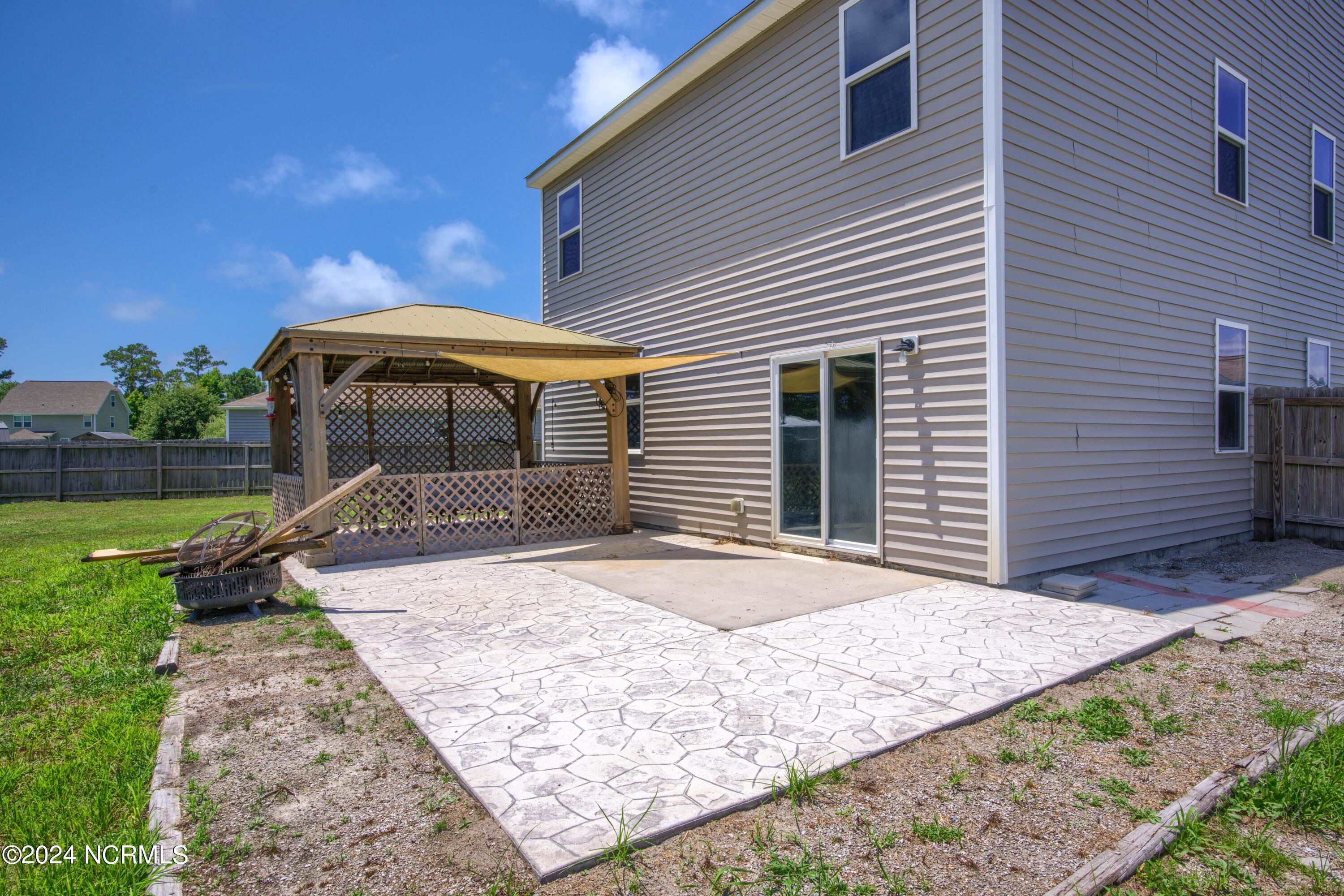 405 Saxby Way Holly Ridge, NC 28445 - Photo 9 of 54 Expanded 20 x 40 Patio