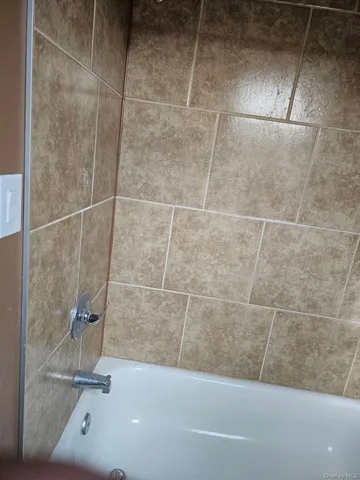 a bathroom with a bathtub