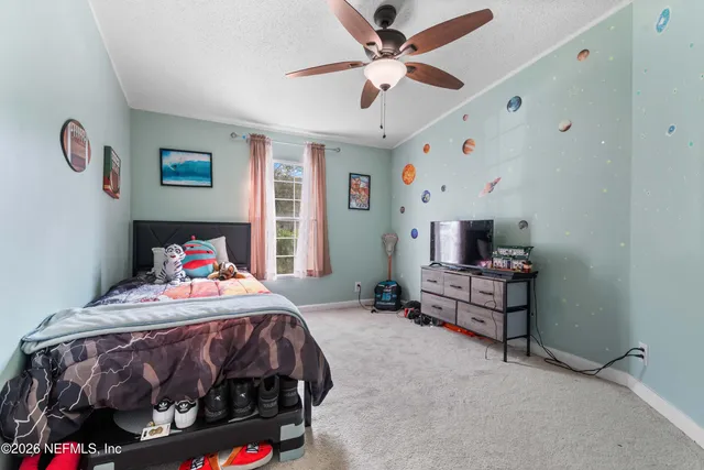 a view of hallway with washer and dryer