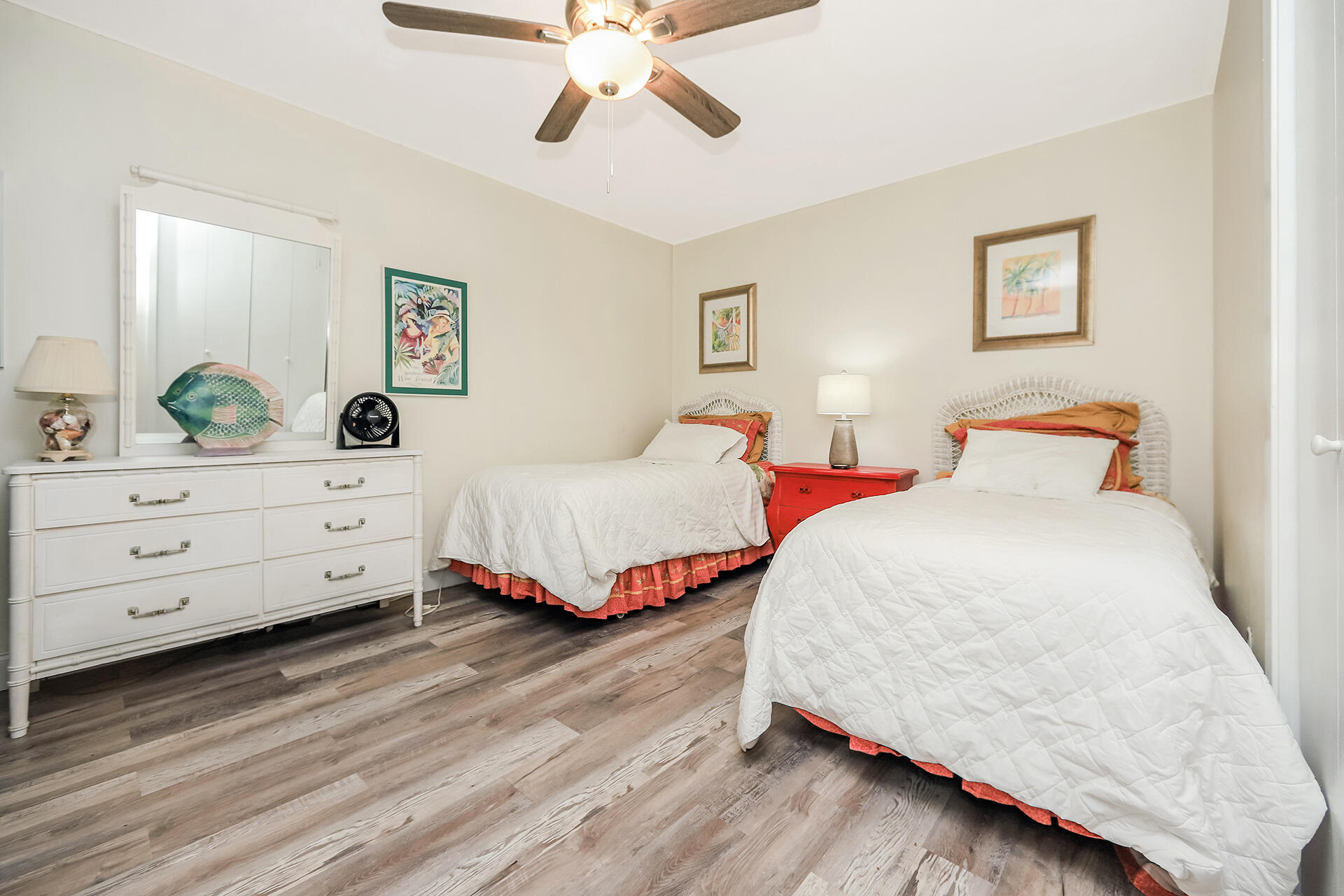 517 Augusta Way, Unit 11001 Miramar Beach, FL 32550 - Photo 15 of 27 a spacious bedroom with two beds and painting on the wall