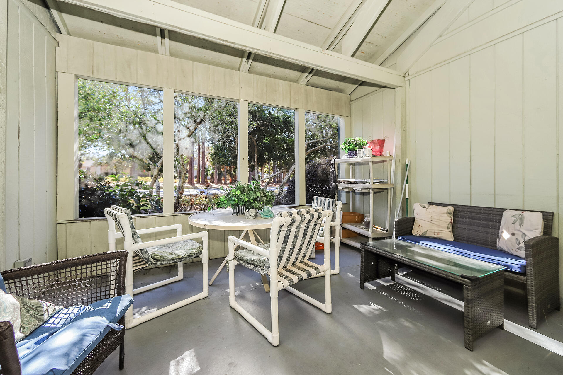 517 Augusta Way, Unit 11001 Miramar Beach, FL 32550 - Photo 19 of 27 a view of a patio with a dining table and chairs