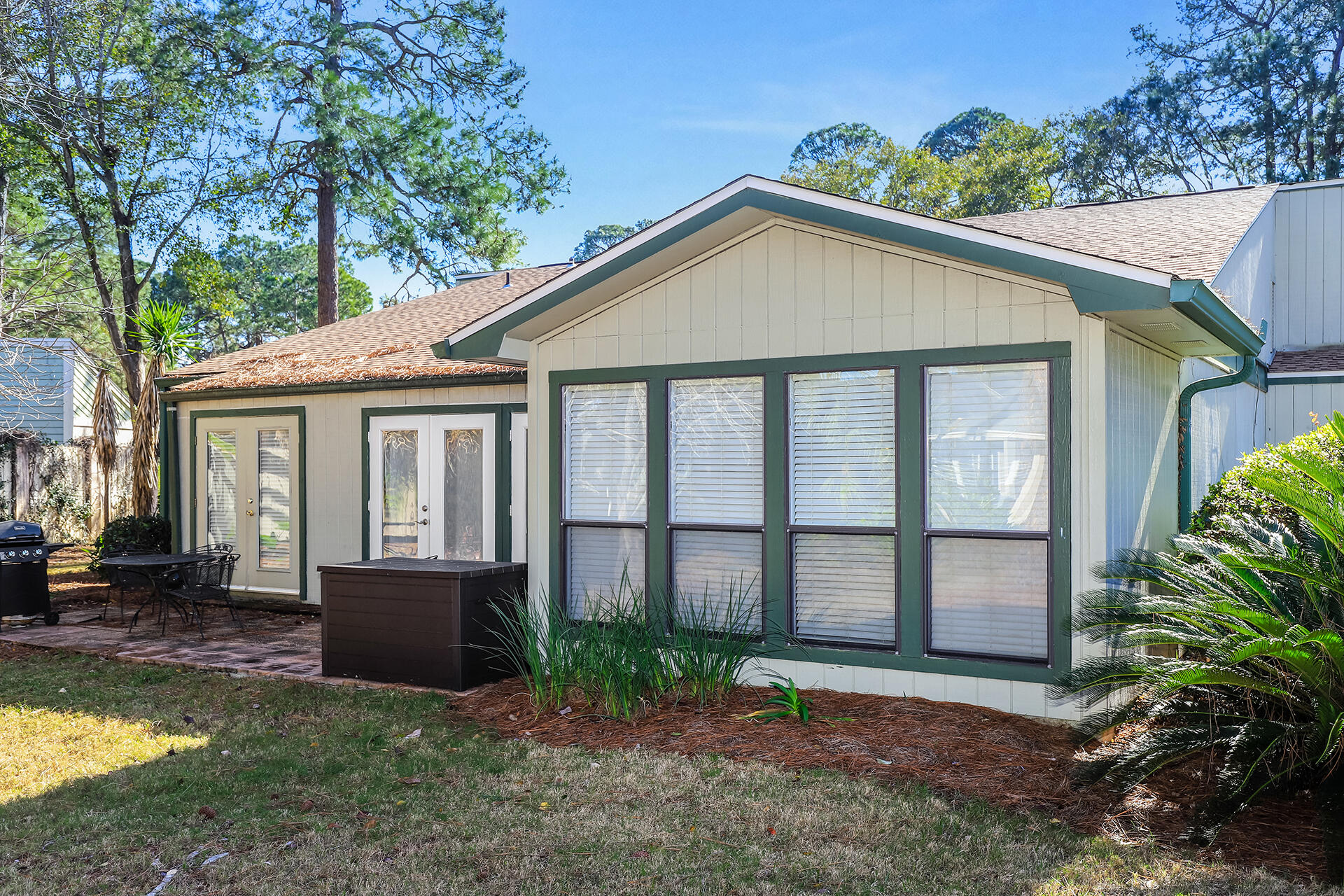 517 Augusta Way, Unit 11001 Miramar Beach, FL 32550 - Photo 26 of 27 a view of a house with backyard and garden