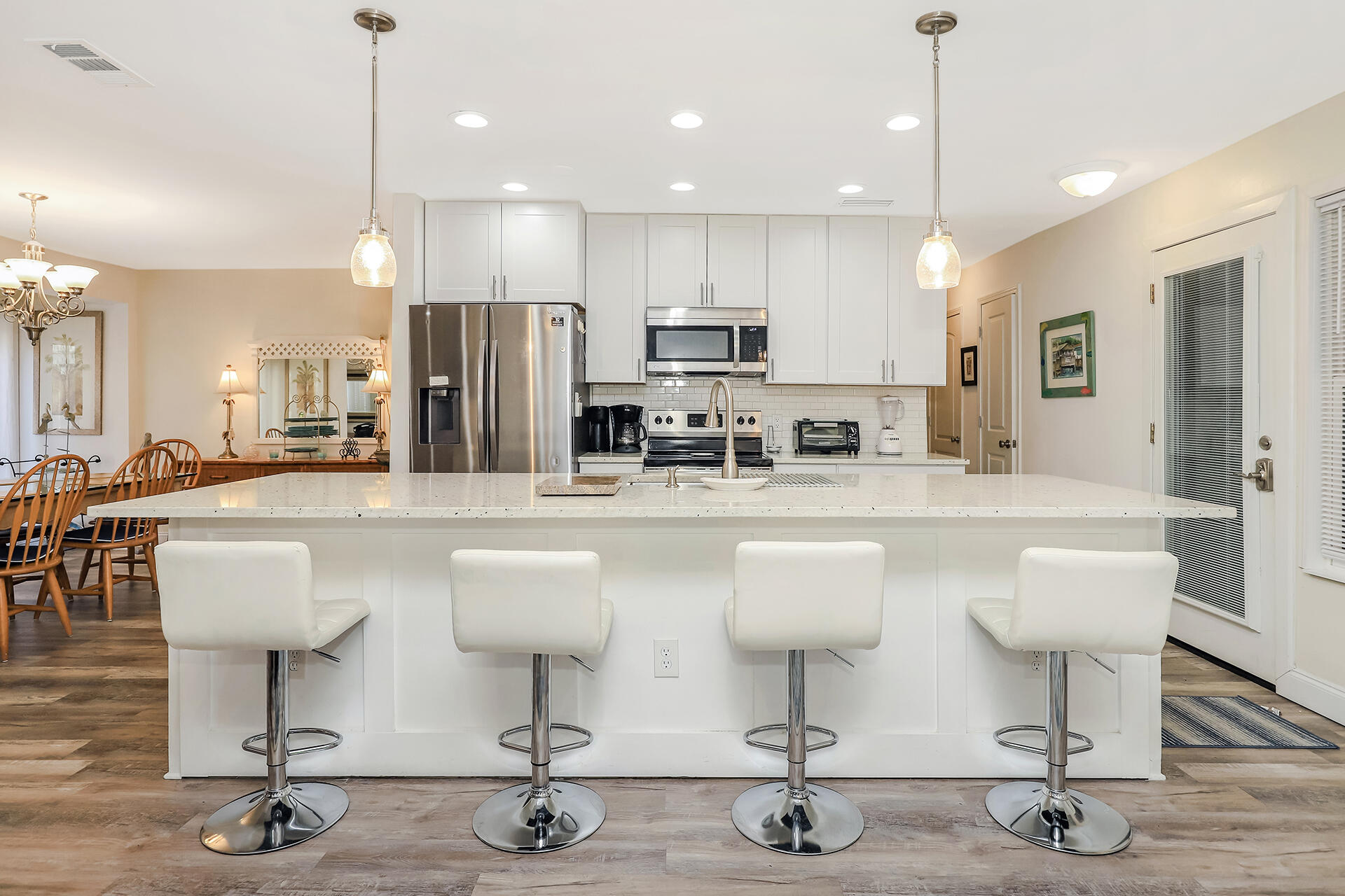 517 Augusta Way, Unit 11001 Miramar Beach, FL 32550 - Photo 3 of 27 a kitchen with lots of counter space furniture and appliances