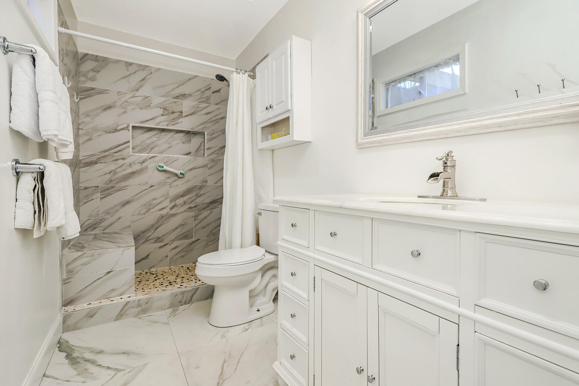 517 Augusta Way, Unit 11001 Miramar Beach, FL 32550 - Photo 10 of 27 a bathroom with a sink toilet and shower