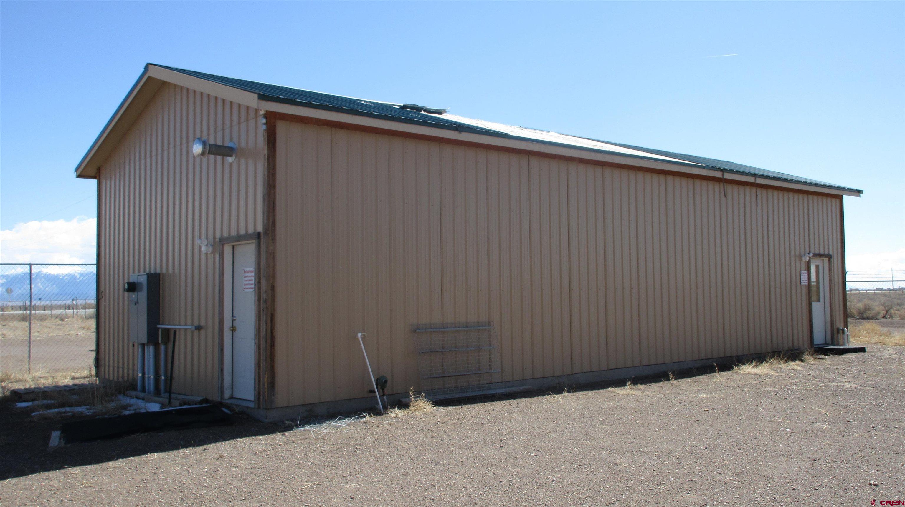 61401 County Road B Center, CO 81125 - Photo 4 of 8 a backyard of a house
