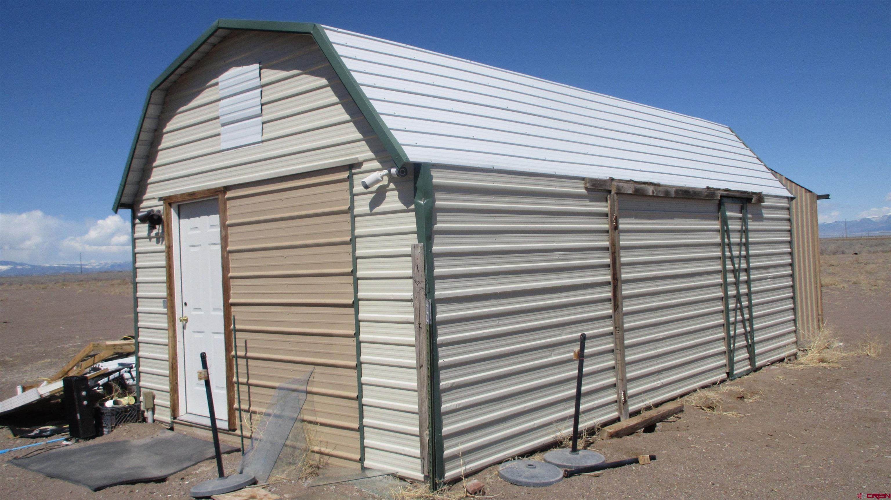 61401 County Road B Center, CO 81125 - Photo 5 of 8 a view of a large white building