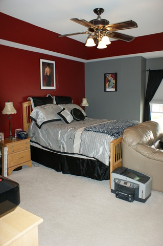 2378 Georgetown Circle Aurora, IL 60503 - Photo 7 of 13 a bedroom with bed and a chandelier