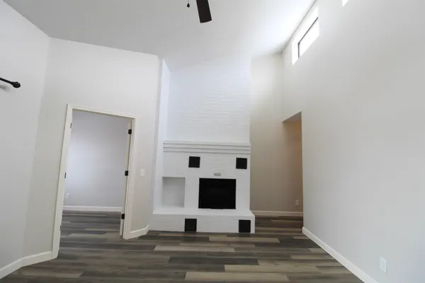 a view of a livingroom with wooden floor