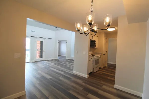 a view of a livingroom with wooden floor