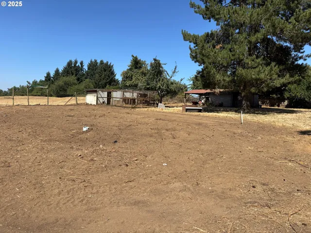 a view of a house with a snow in the yard