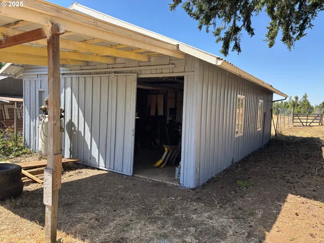 a view of a chairs and tables in patio