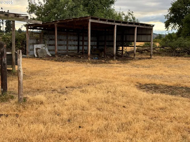 a view of balcony with floor to ceiling window with wooden floor