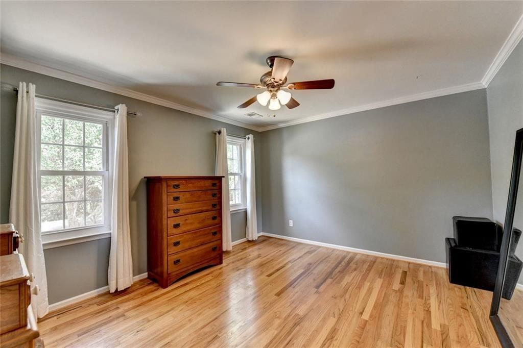 3310 Danielle Way Suwanee, GA 30024 - Photo 19 of 31 a view of room with window and a ceiling fan