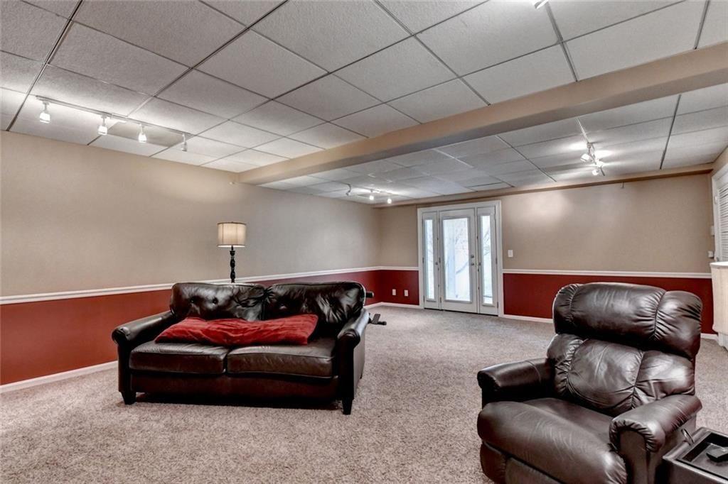 3310 Danielle Way Suwanee, GA 30024 - Photo 23 of 31 a living room with furniture and a couch