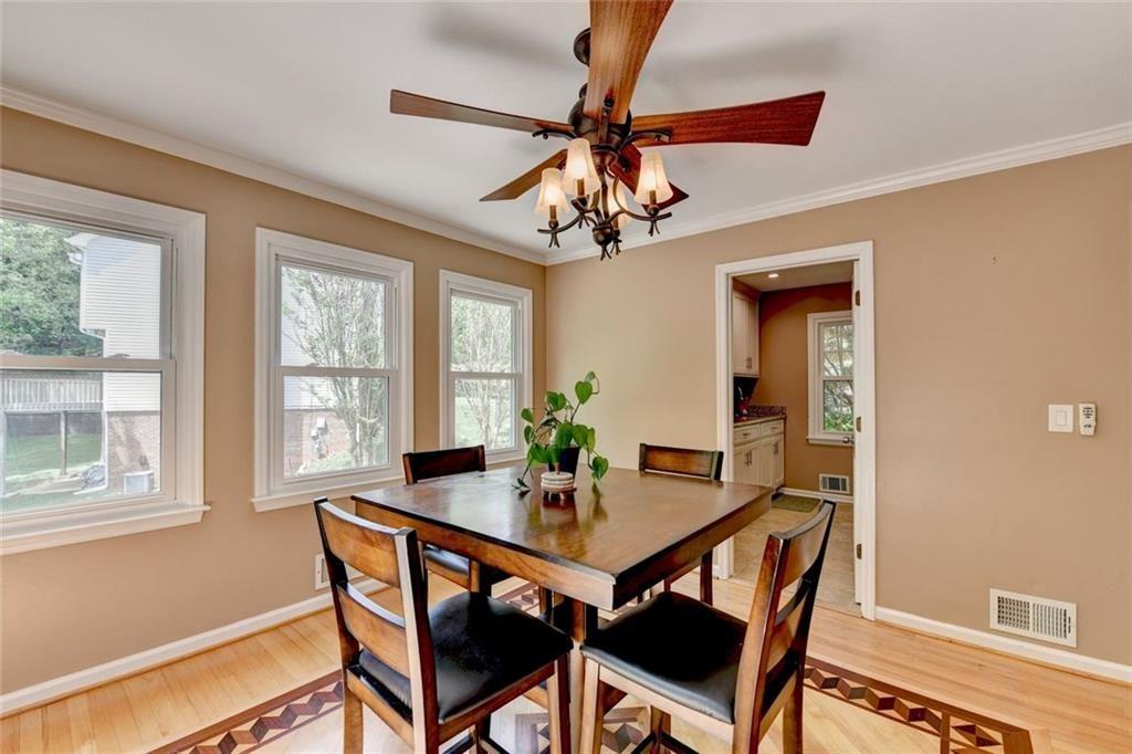 3310 Danielle Way Suwanee, GA 30024 - Photo 10 of 31 a view of a dining room with furniture window and outside view