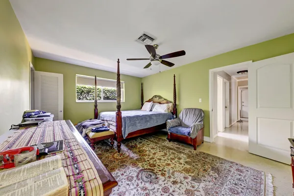 a living room with furniture rug and window