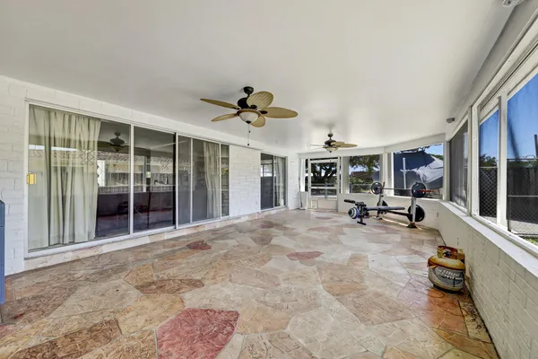 a view of a livingroom with couch and porch