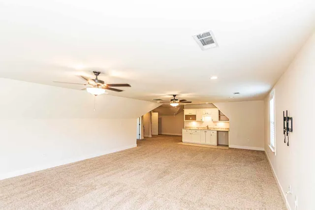 a view of a room with natural light