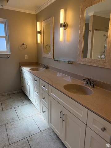 1259 West Raintree Drive Price, UT 84501 - Photo 2 of 10 Full bath featuring crown molding, double vanity, and a shower