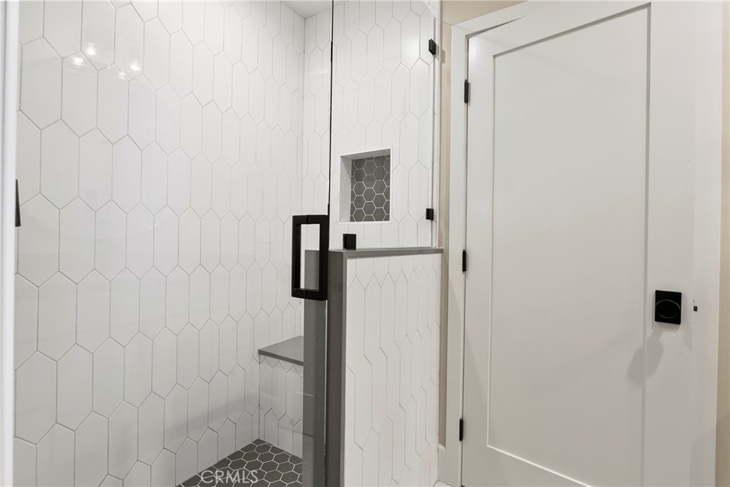 354 La Perle Place, Unit B Costa Mesa, CA 92627 - Photo 15 of 16 a bathroom with a shower