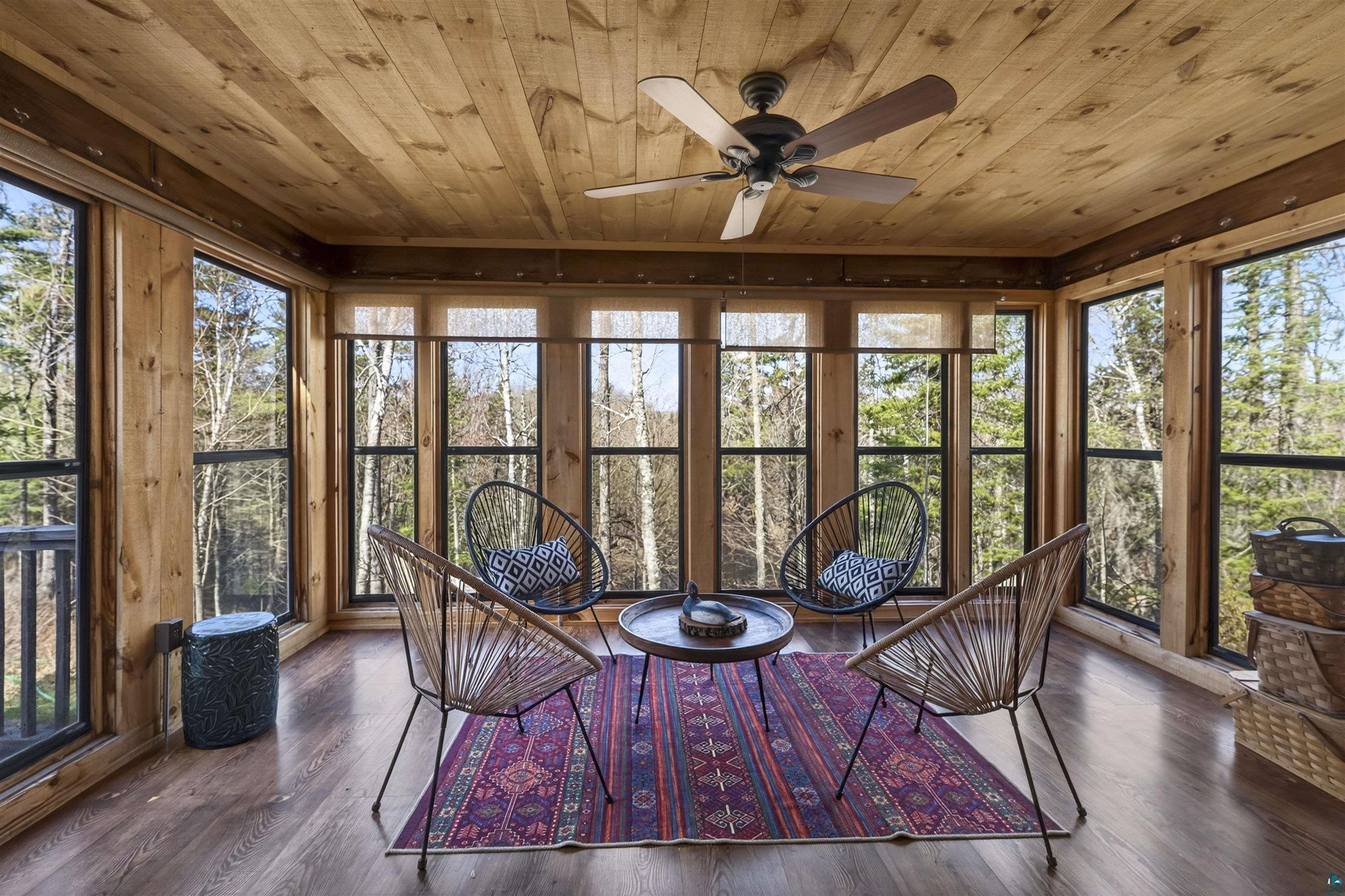 13885 Park Road Brule, WI 54820 - Photo 7 of 41 Sunroom with wood-paneled walls and ceiling