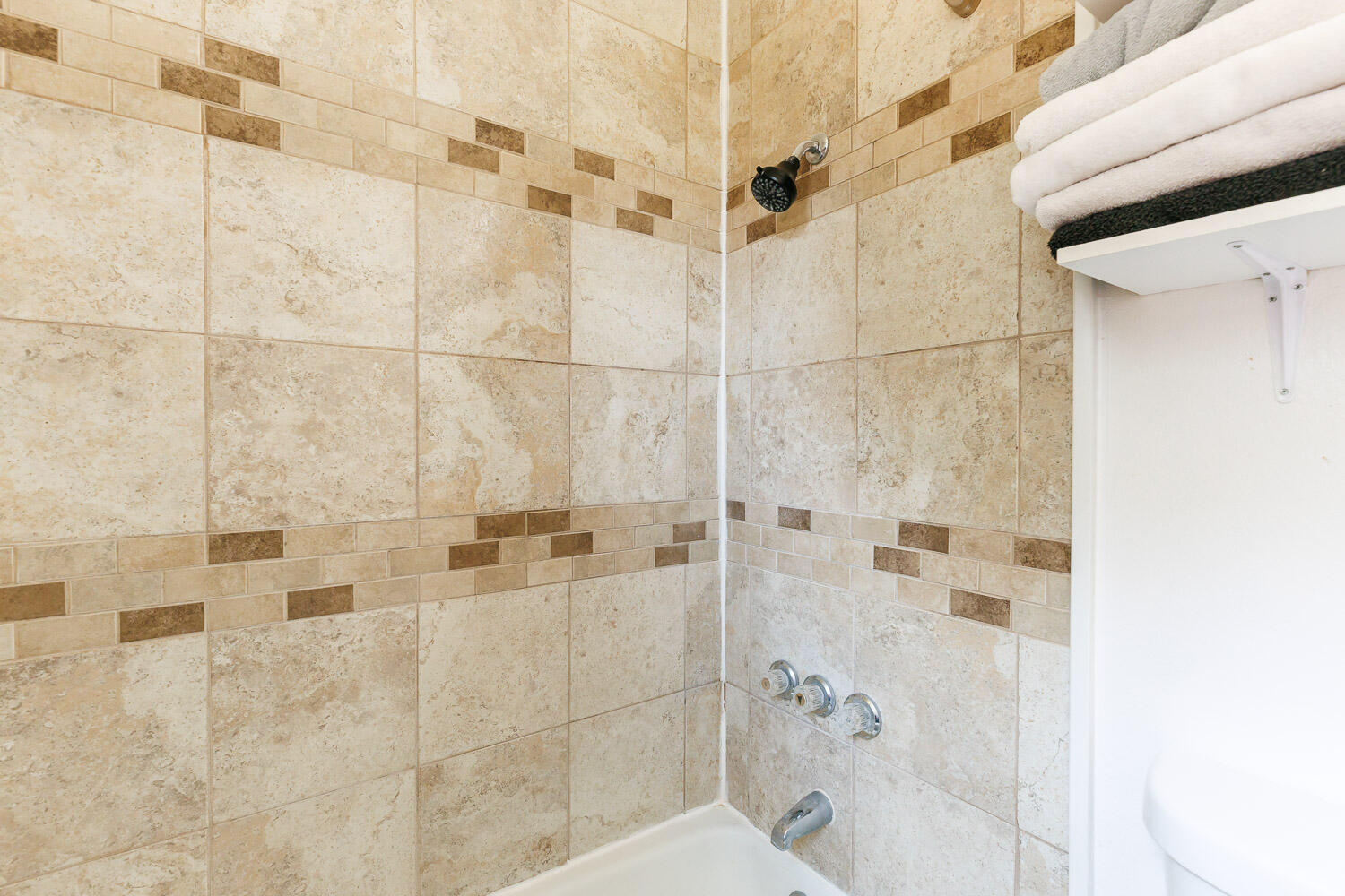 4609 Kemper Street Lubbock, TX 79416 - Photo 18 of 33 a bathroom with a shower