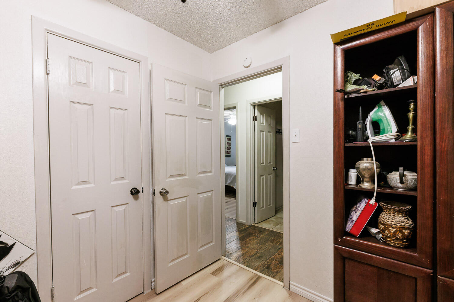 4609 Kemper Street Lubbock, TX 79416 - Photo 21 of 33 a view of a hallway with closet and toys