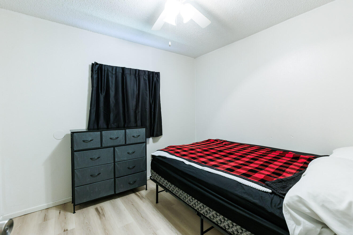 4609 Kemper Street Lubbock, TX 79416 - Photo 23 of 33 a bedroom with a bed and a closet