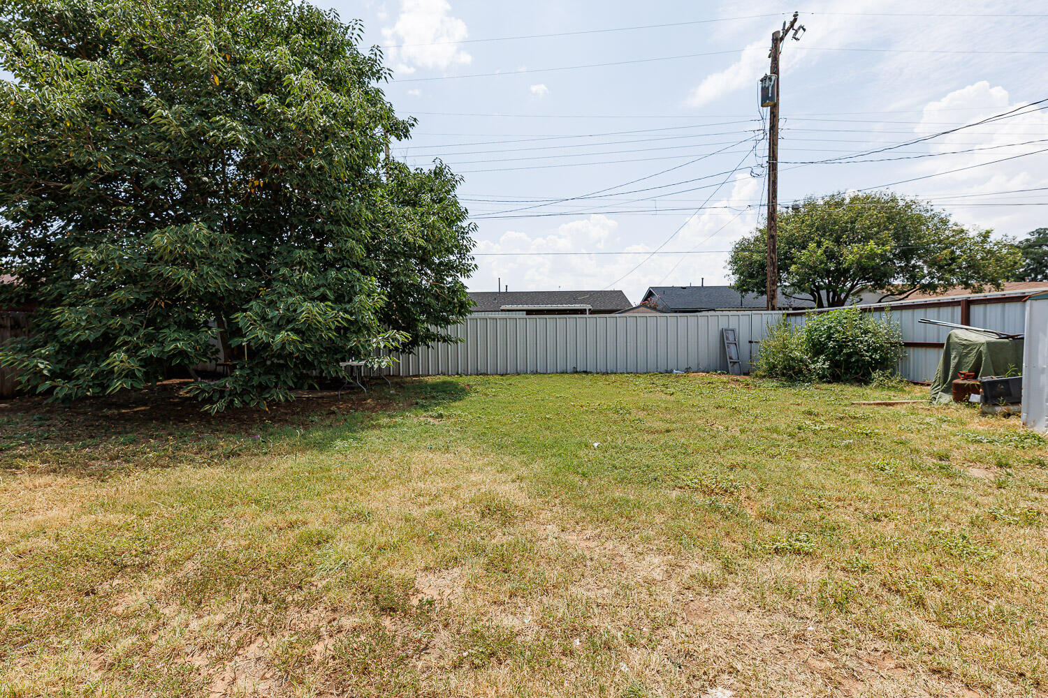4609 Kemper Street Lubbock, TX 79416 - Photo 5 of 33 a view of a backyard