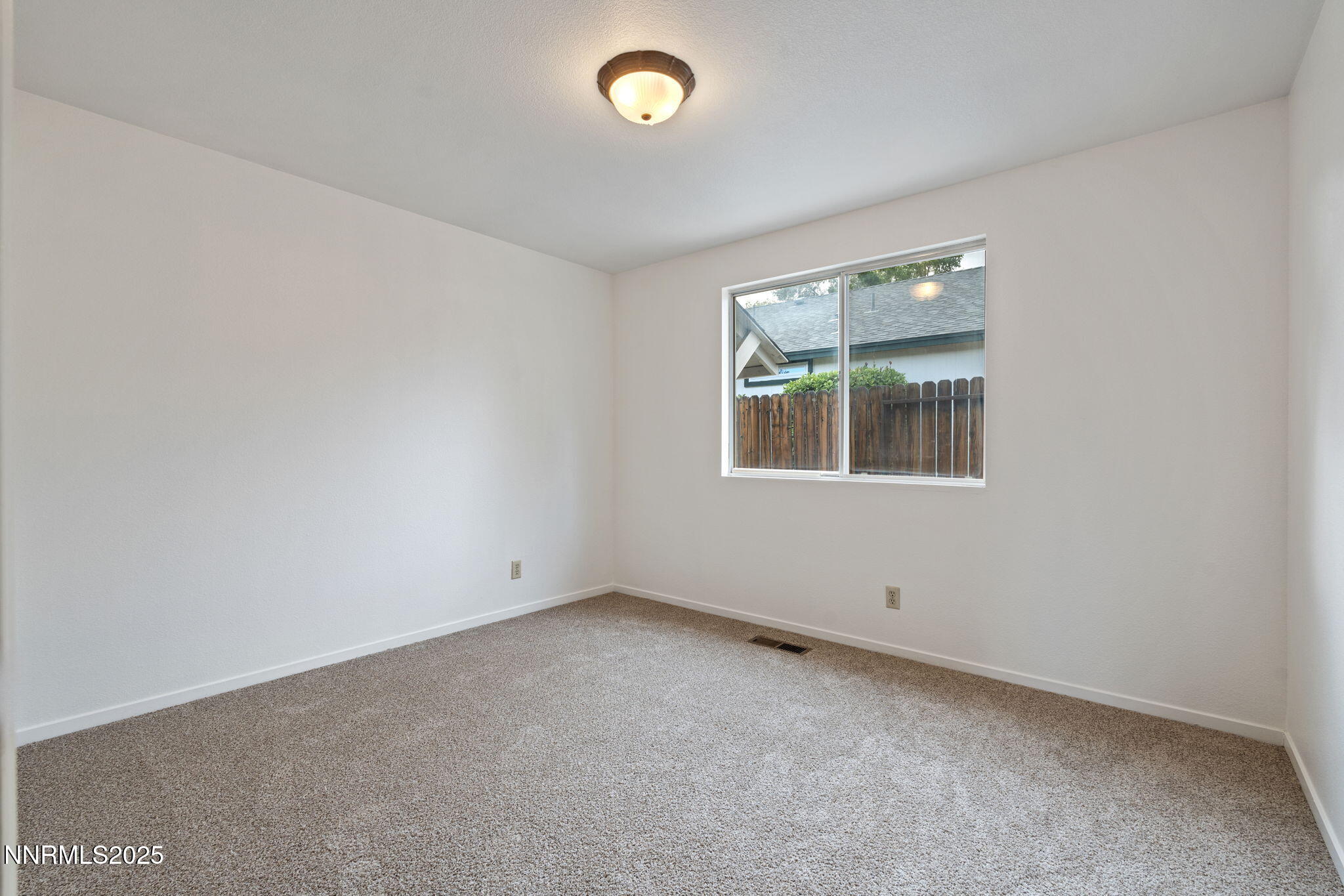 6811 Sonterra Lane Reno, NV 89523 - Photo 14 of 25 an empty room with windows