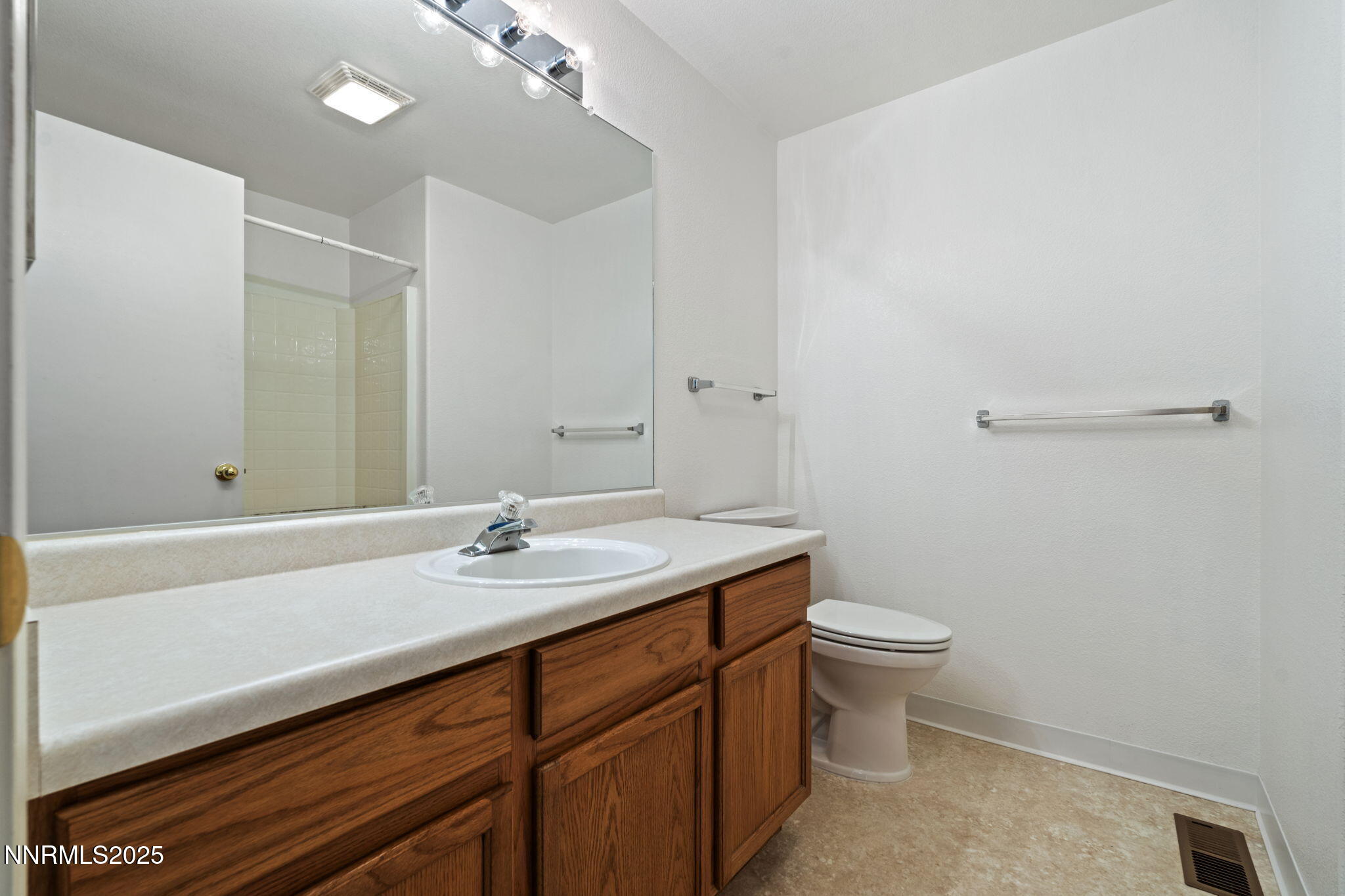 6811 Sonterra Lane Reno, NV 89523 - Photo 16 of 25 a bathroom with a sink and a toilet