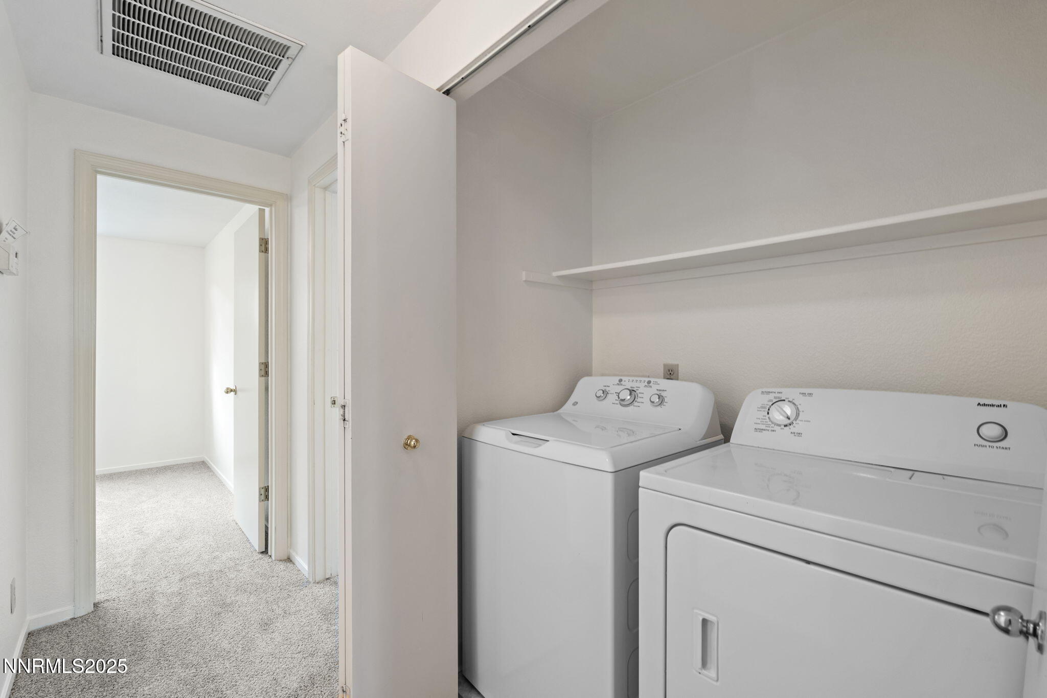 6811 Sonterra Lane Reno, NV 89523 - Photo 17 of 25 a view of storage and utility room with washer and dryer
