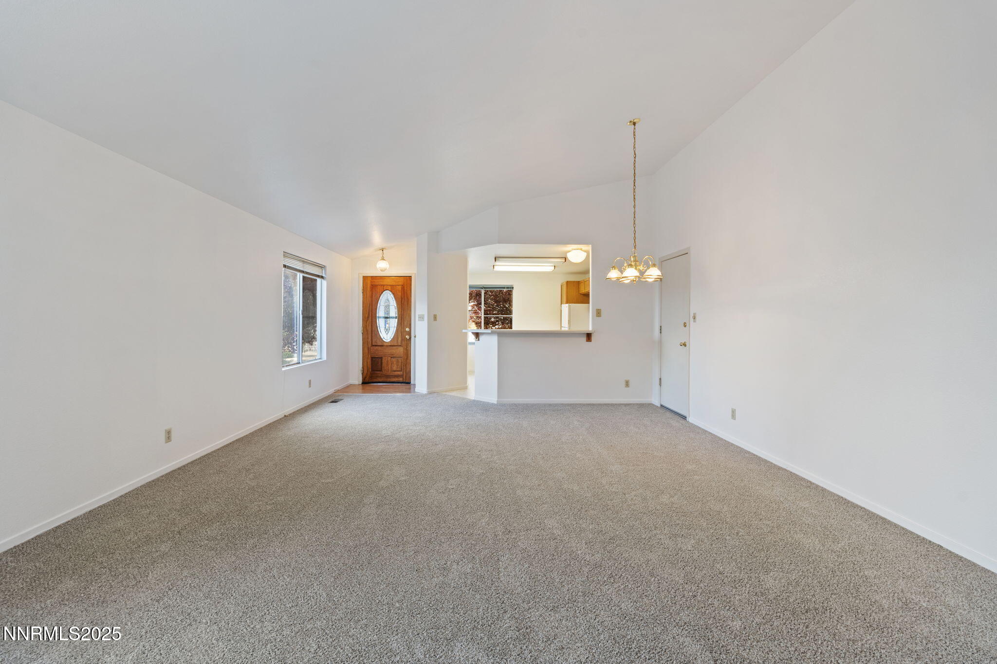 6811 Sonterra Lane Reno, NV 89523 - Photo 4 of 25 a view of a room with a ceiling fan and window