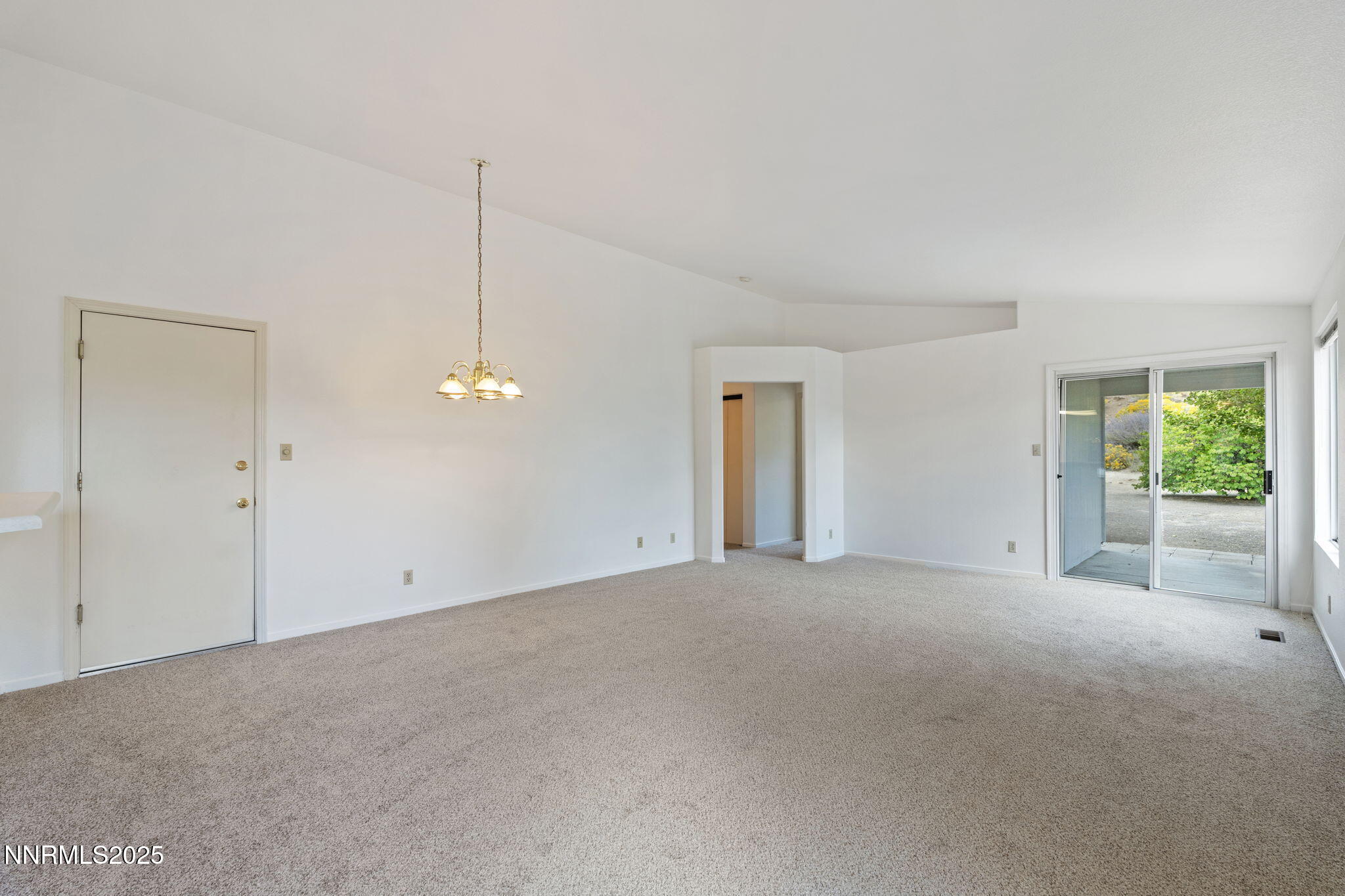 6811 Sonterra Lane Reno, NV 89523 - Photo 6 of 25 a view of a room with a ceiling fan and window