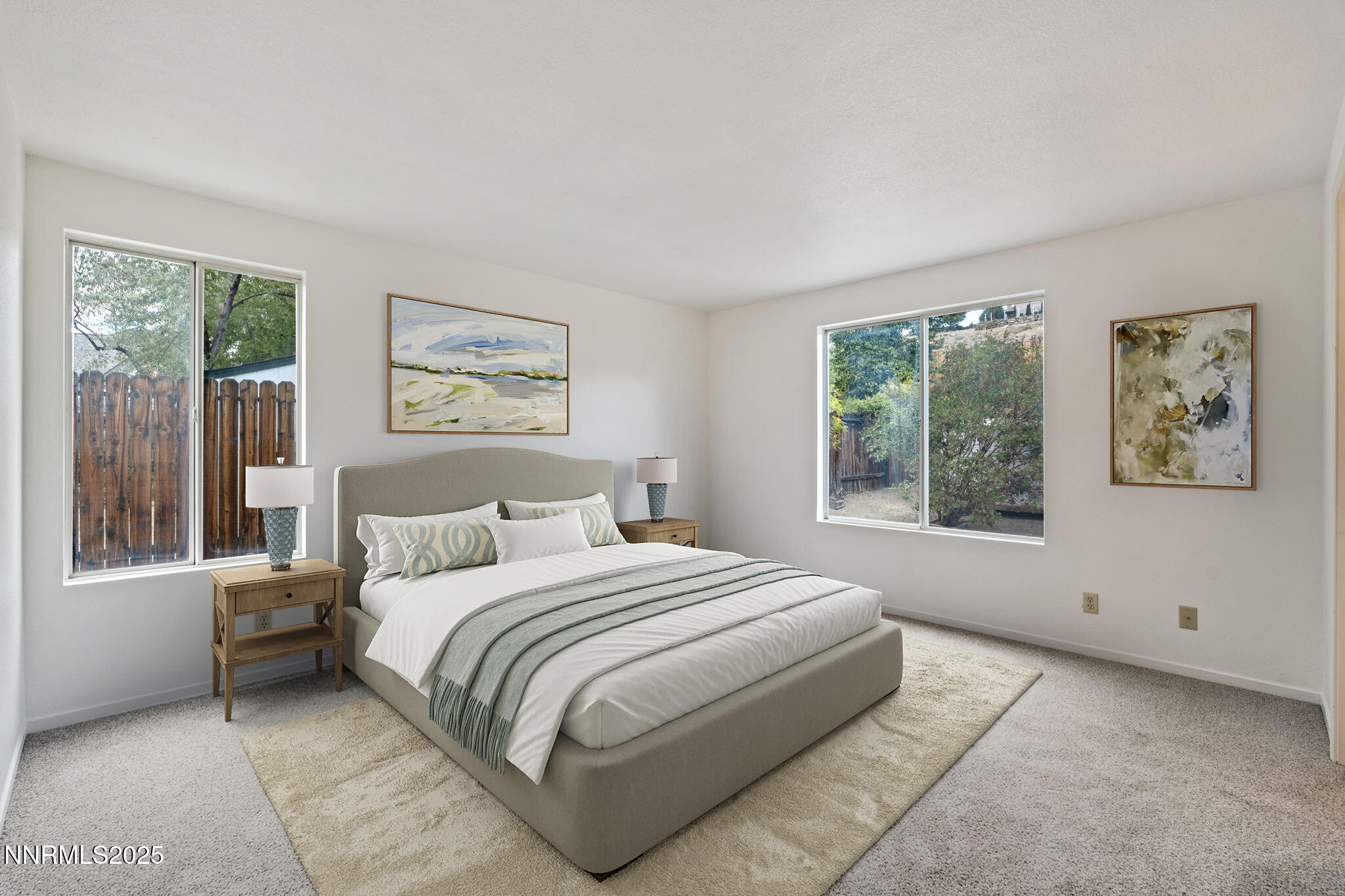 6811 Sonterra Lane Reno, NV 89523 - Photo 10 of 25 a bedroom with a large bed and a window