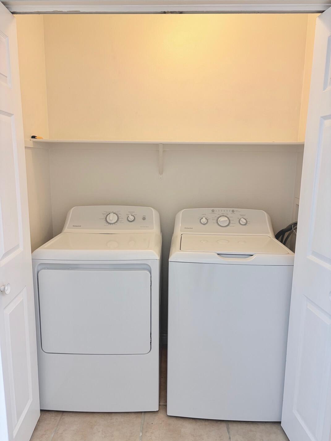43376 Cook Street, Unit 32 Palm Desert, CA 92211 - Photo 19 of 31 a utility room with dryer and washer