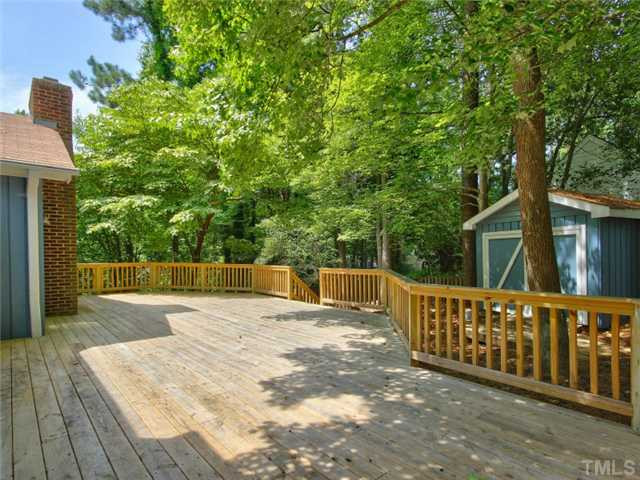 2701 Smokey Ridge Road Raleigh, NC 27613 - Photo 21 of 25 This deck is amazing. What an entertainment area. You can also see the storage building Patio/Deck