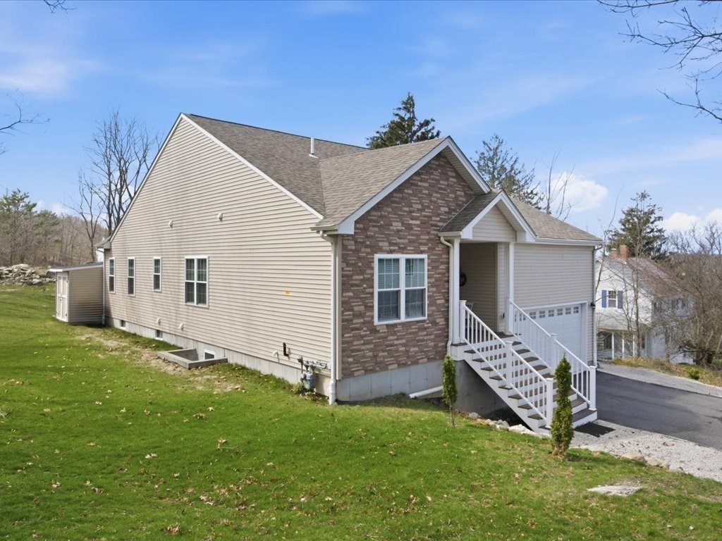 67 Ling Street Fall River, MA 02720 - Photo 1 of 32 a view of a house with a yard