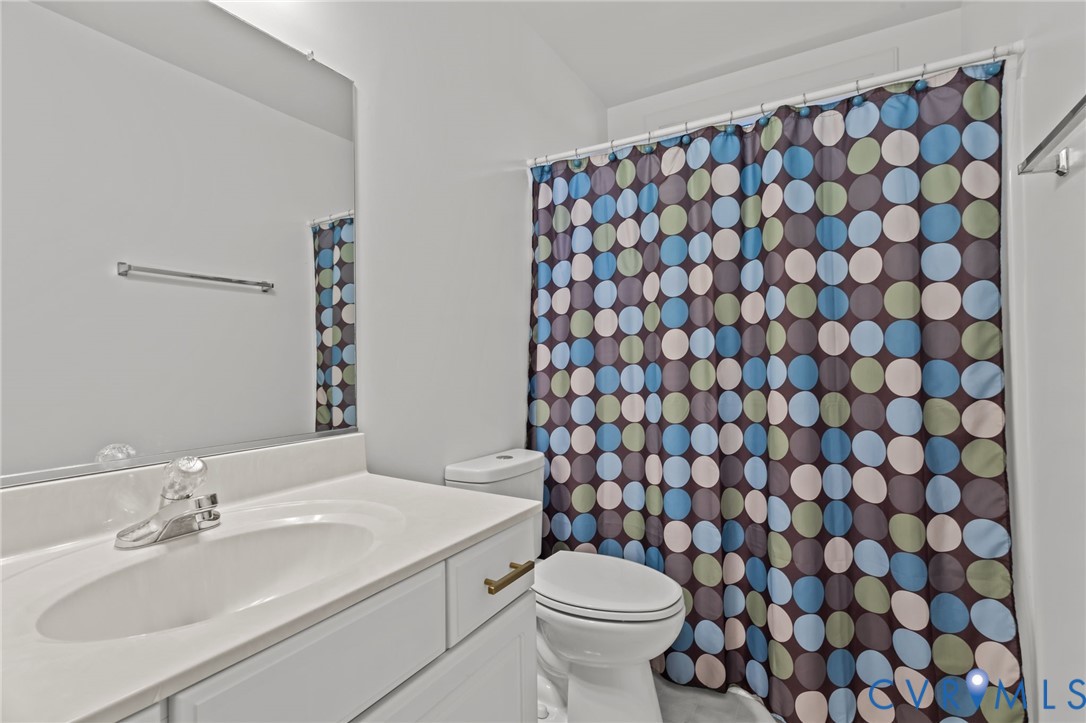 518 Rebel Ridge Road Colonial Heights, VA 23834 - Photo 21 of 44 a bathroom with a sink and a toilet