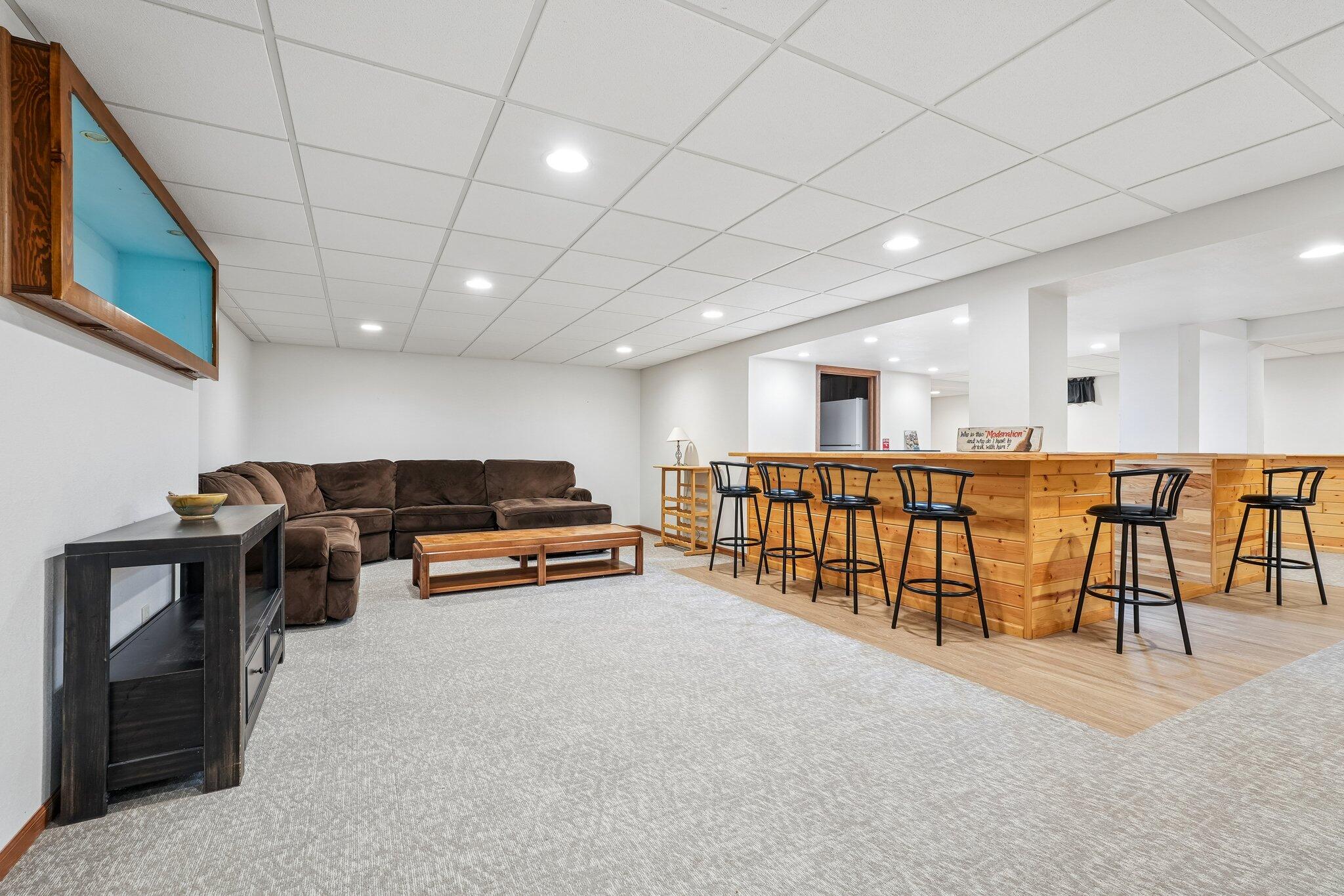 1202 Green Tree Road West Bend, WI 53090 - Photo 25 of 35 Finished Basement with bar!