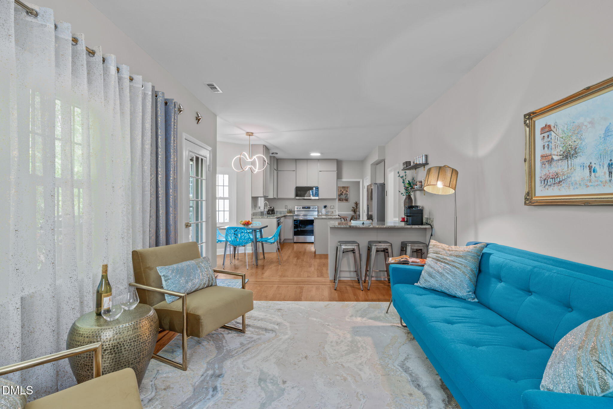 104 Lost Tree Lane Cary, NC 27513 - Photo 12 of 54 a living room with furniture kitchen view and a window