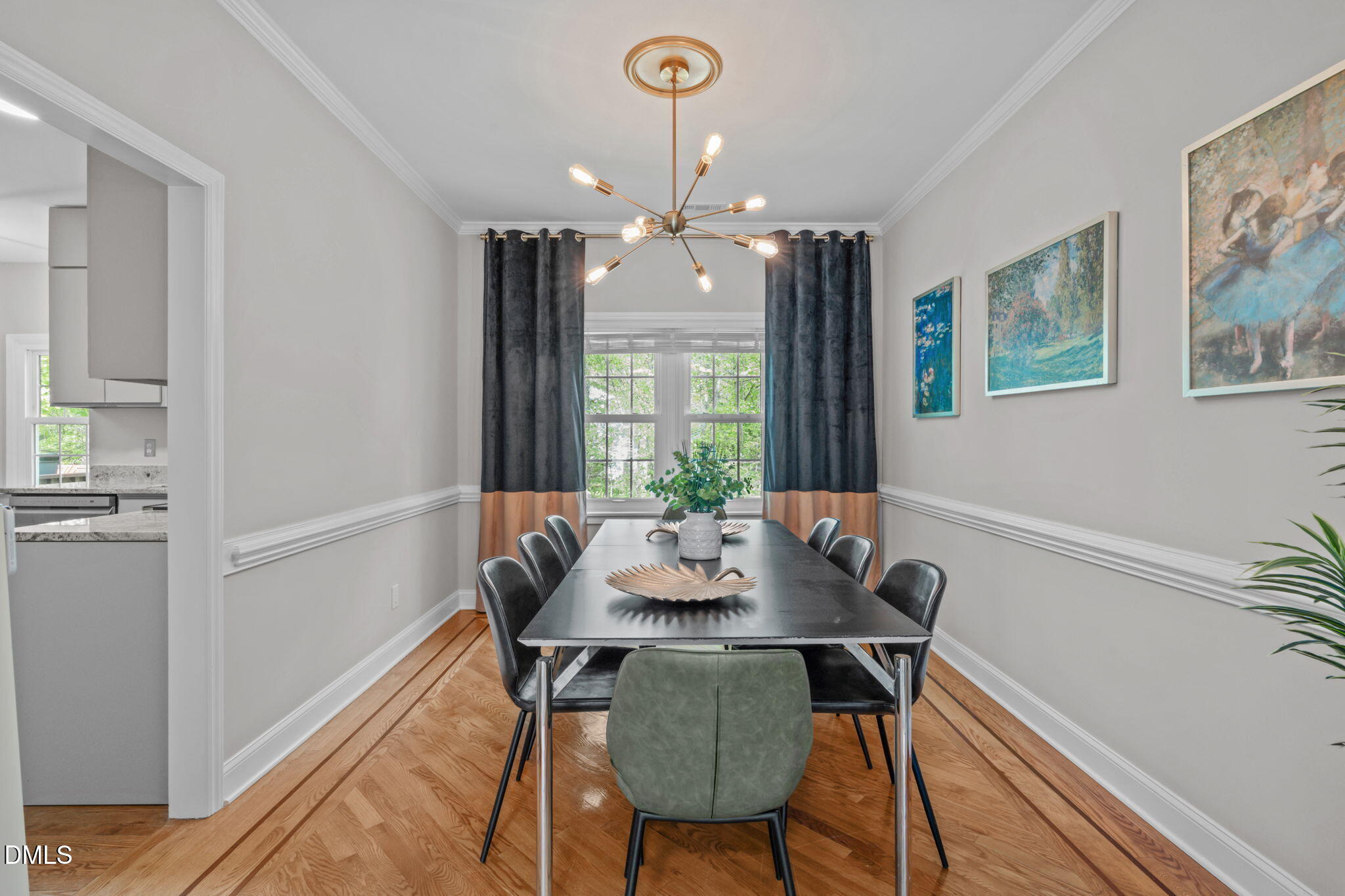 104 Lost Tree Lane Cary, NC 27513 - Photo 13 of 54 a view of a dining room with furniture window and wooden floor