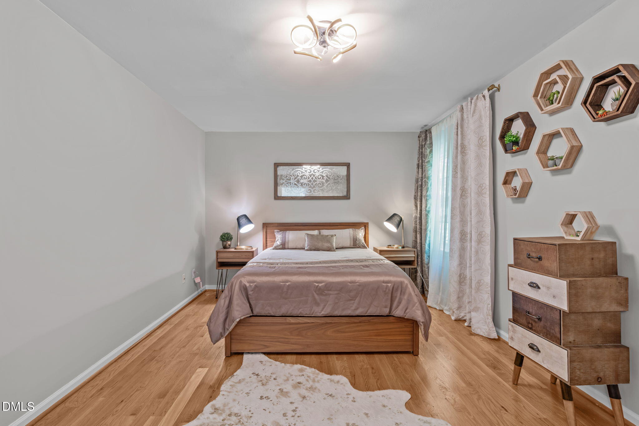 104 Lost Tree Lane Cary, NC 27513 - Photo 21 of 54 a bedroom with a bed and a window